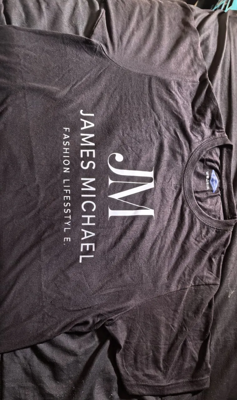 Signature Tee — Heavyweight cotton, front wordmark print. (placeholder photography)